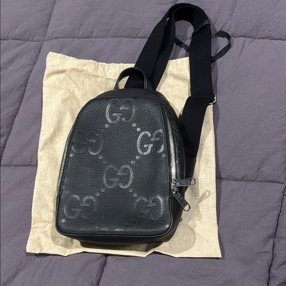 Gucci authentic. Mini jumbo GG crossbody backpack. Never used. - Picture 2 of 7